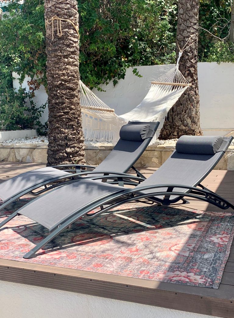 Sun loungers on terrace at Villa Orquídea in Dénia