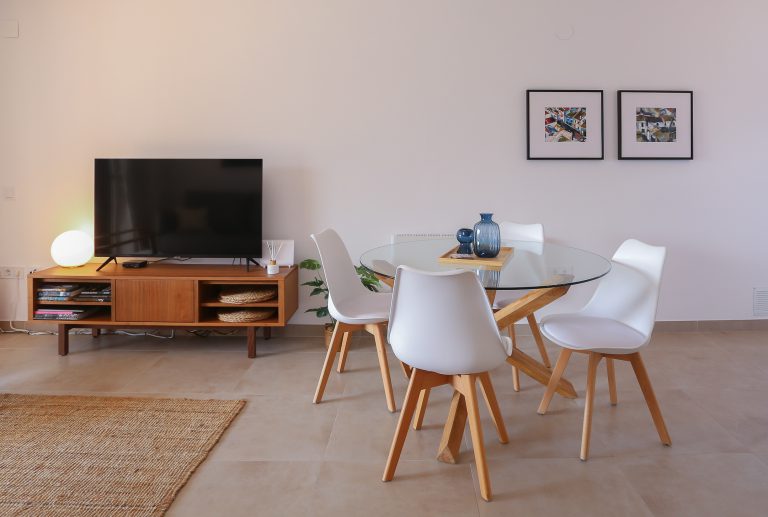 Dining table and seating area at apartment Retiro Sol B14 in Dénia