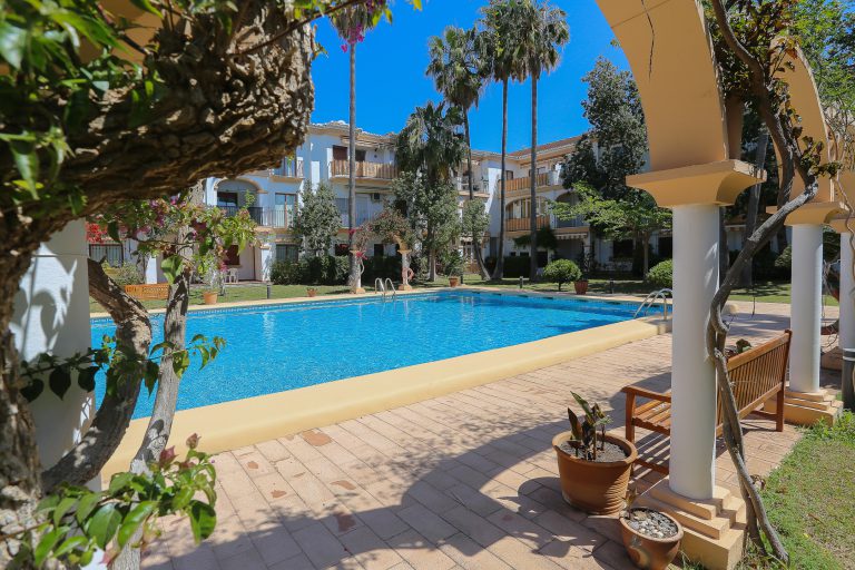 Pool view from terrace at apartment El Patio in Dénia