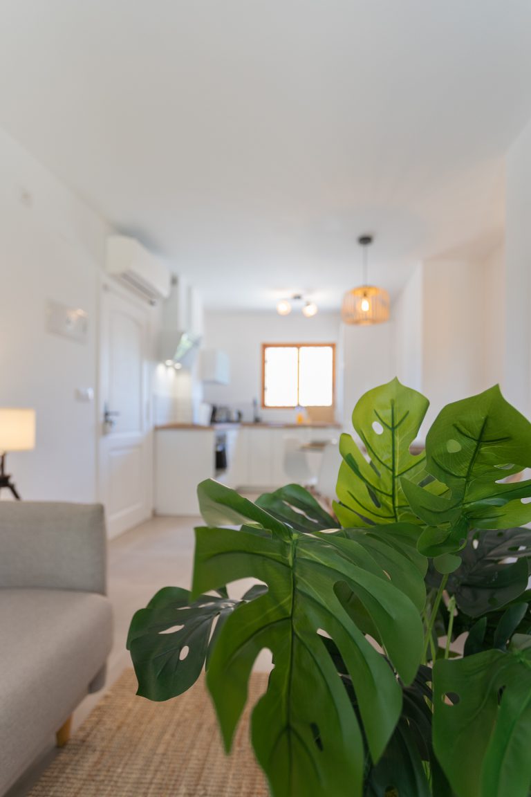 Living room with seating area at apartment El Patio in Dénia