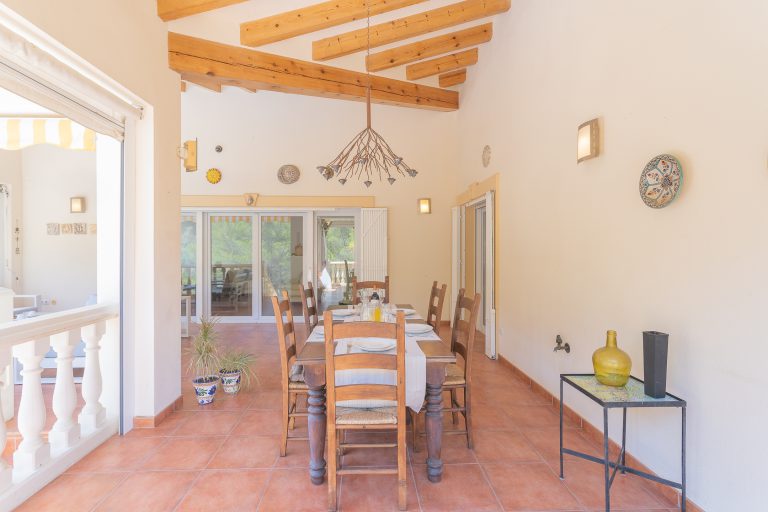 Dining area with open living space at Villa Casa Joni in Orba