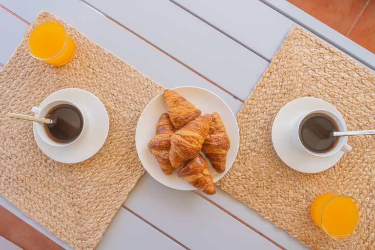 Breakfast with coffee and croissants at Villa Casa Joni in Orba