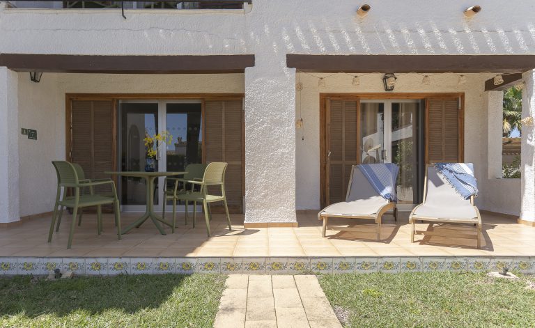 Terrace with outdoor seating at apartment Retiro Sol B01 in Dénia