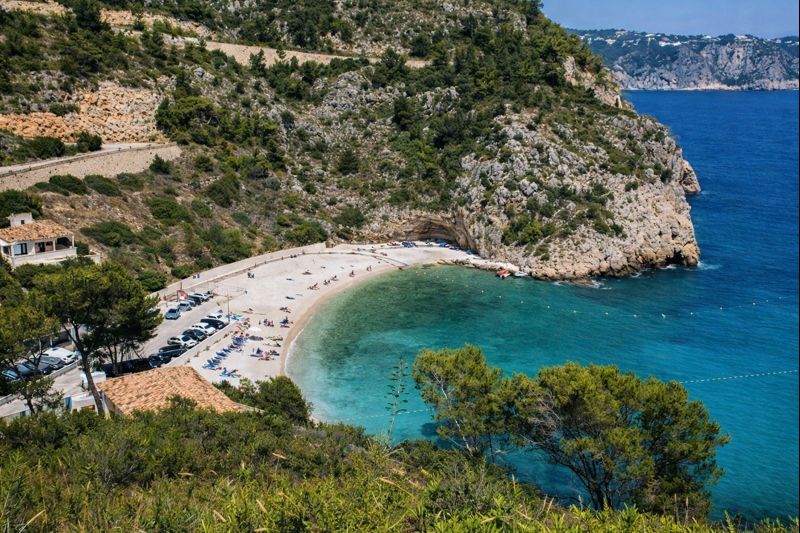 Hillside coastline of Costa Blanca North with low-rise homes and Mediterranean sea