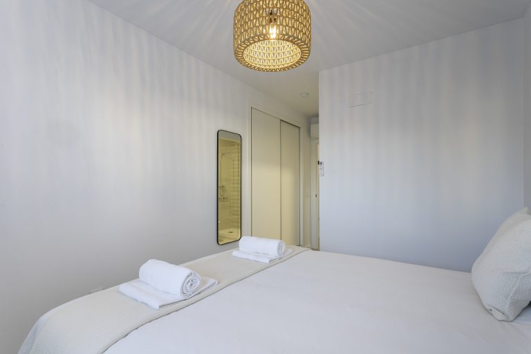 Bedroom with window in Casa Valys villa